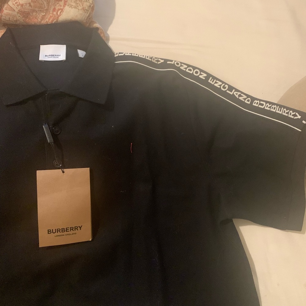 Burberry polo shirt in piqué cotton with logoed bands